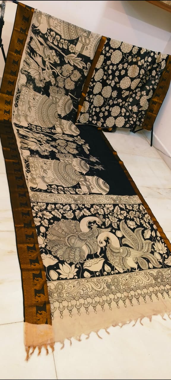 Mangalagiri Silk Black & White - (A sophisticated black and beige traditional textile showcasing ornate peacock motifs, lush floral patterns.)