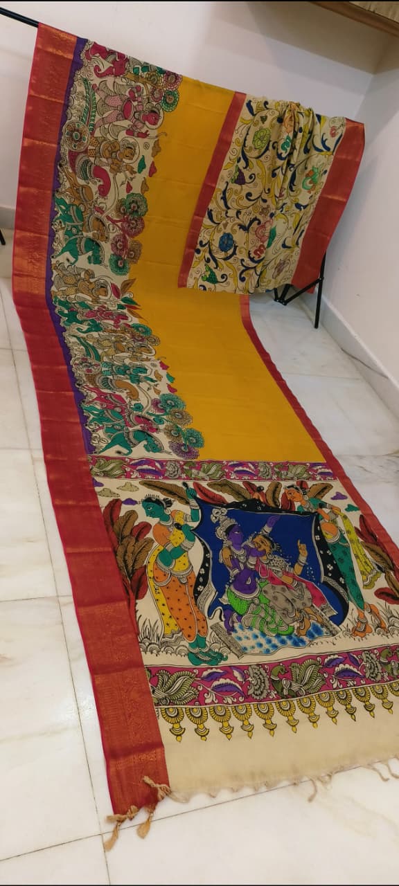 Mangalagiri Pure Pattu saree - (The saree showcasing detailed mythological storytelling, floral accents, and a rich traditional border.)