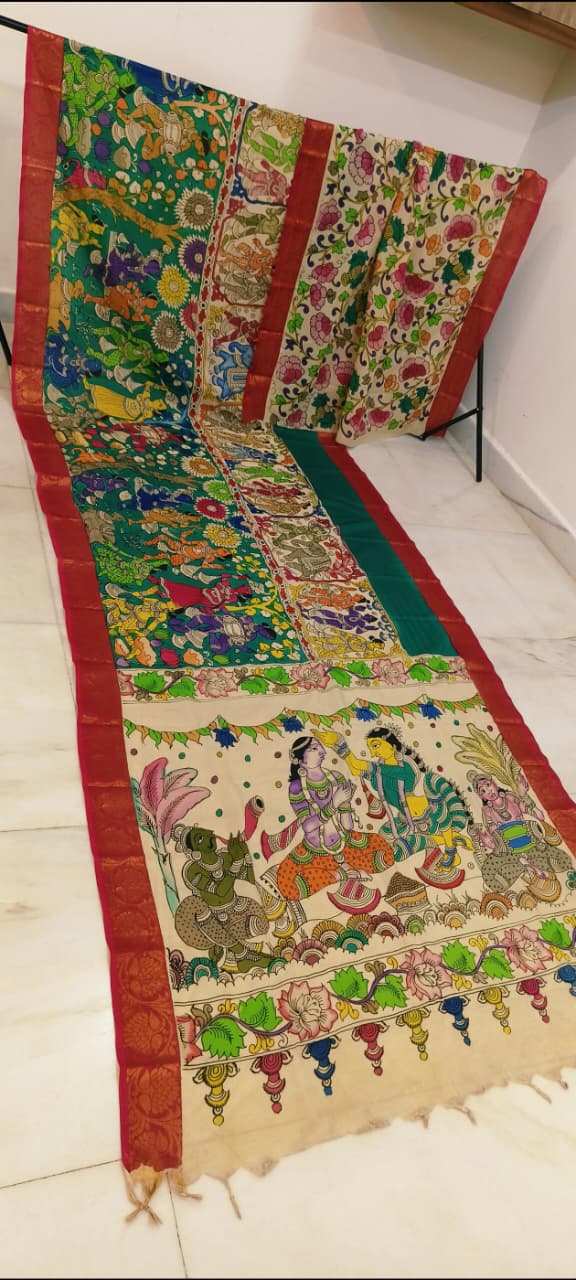 Mangalagiri Silk Multi Coloured - (A richly colored traditional textile showcasing lively floral patterns and a pallu with festive folk and mythological figures.)