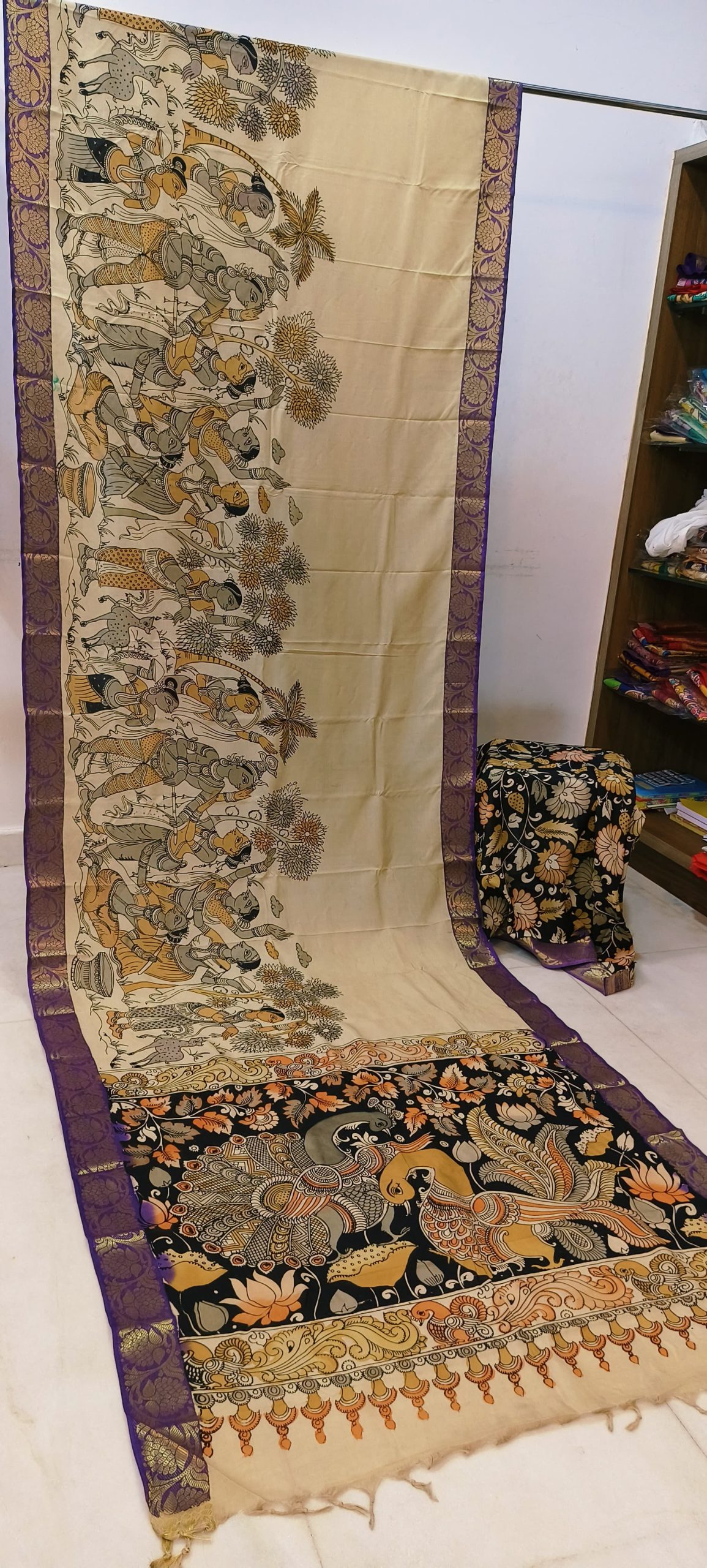 Mangalagiri Silk Multi Coloured - (A graceful traditional textile highlighted with intricate mythological scenes, peacock motifs.)